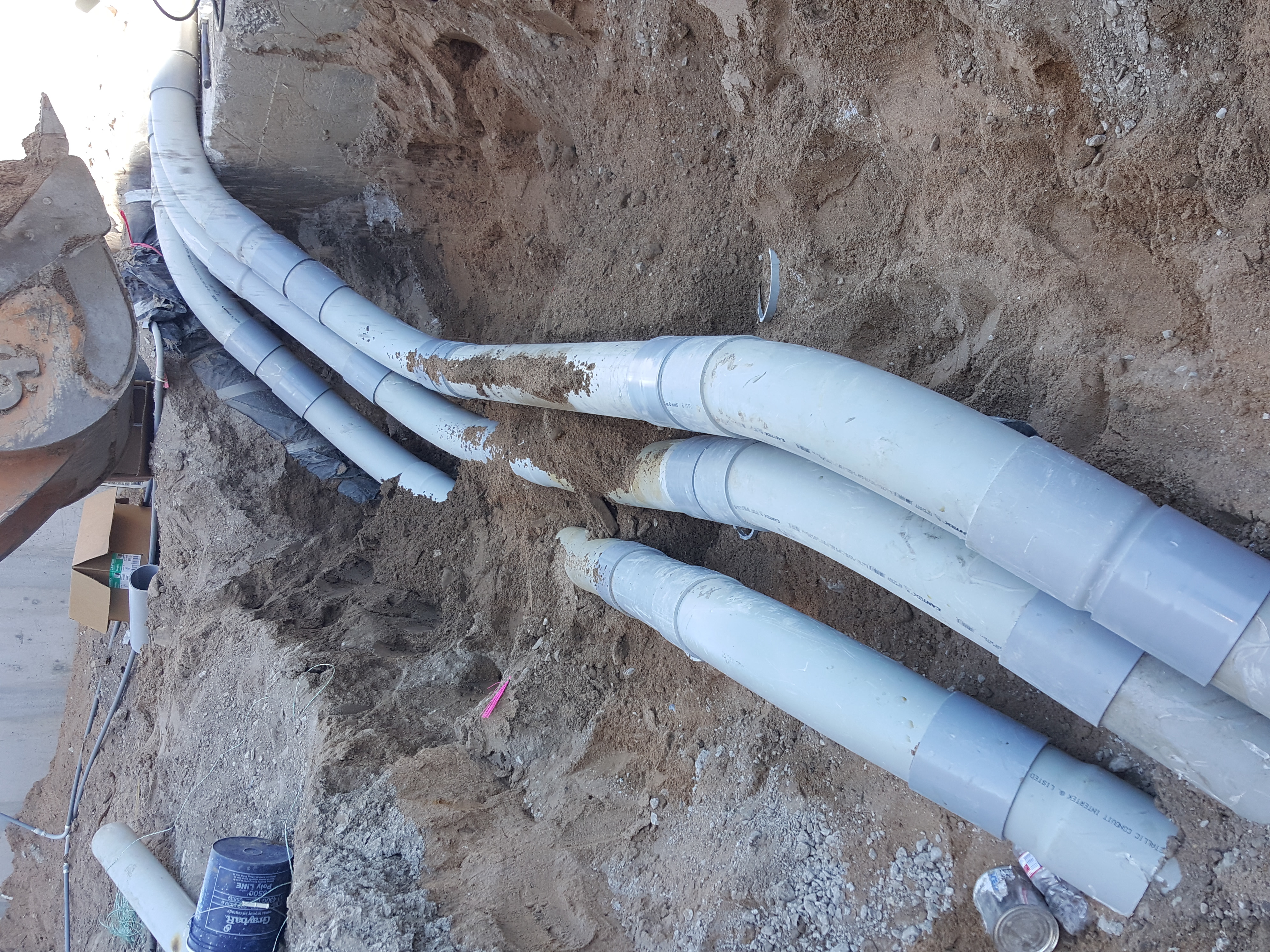 Conduit sweeps rising from a GEI duct bank trench