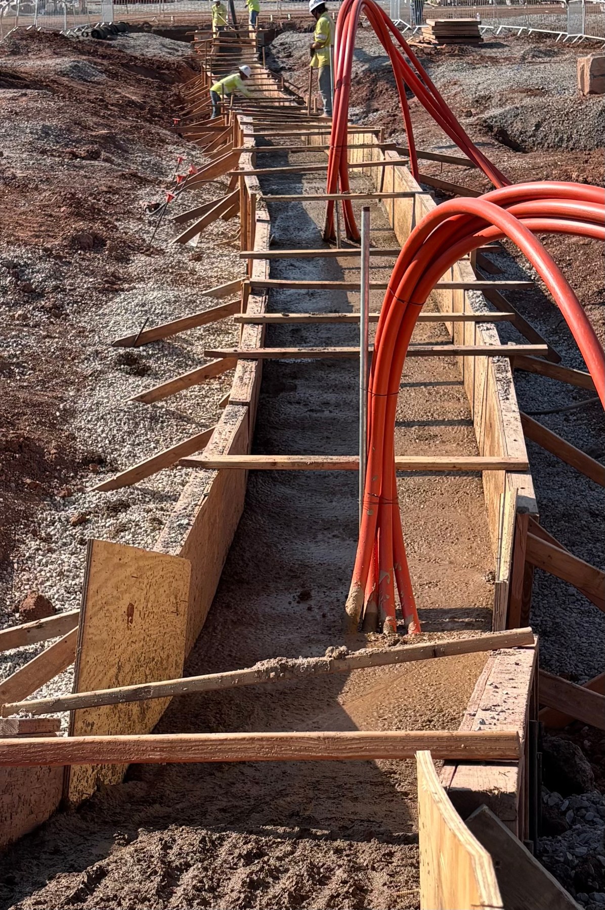 Medium-voltage conduit in a formed duct bank trench