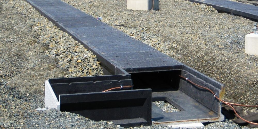 Polymer concrete fiber trench trough installation