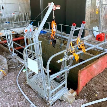 Trench protective system with guardrail, ladder and fall-arrest davit
